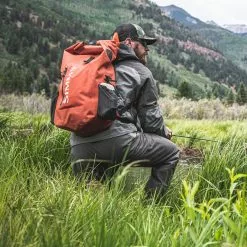 Simms Fishing Products Simms Dry Creek Rolltop Backpack -FLIES Sales 13463 800 Dry Creek Rolltop Backpack lifestyle S22 1680x 81e14b87 e87b 4b1a 8a28 251ee342f5d7